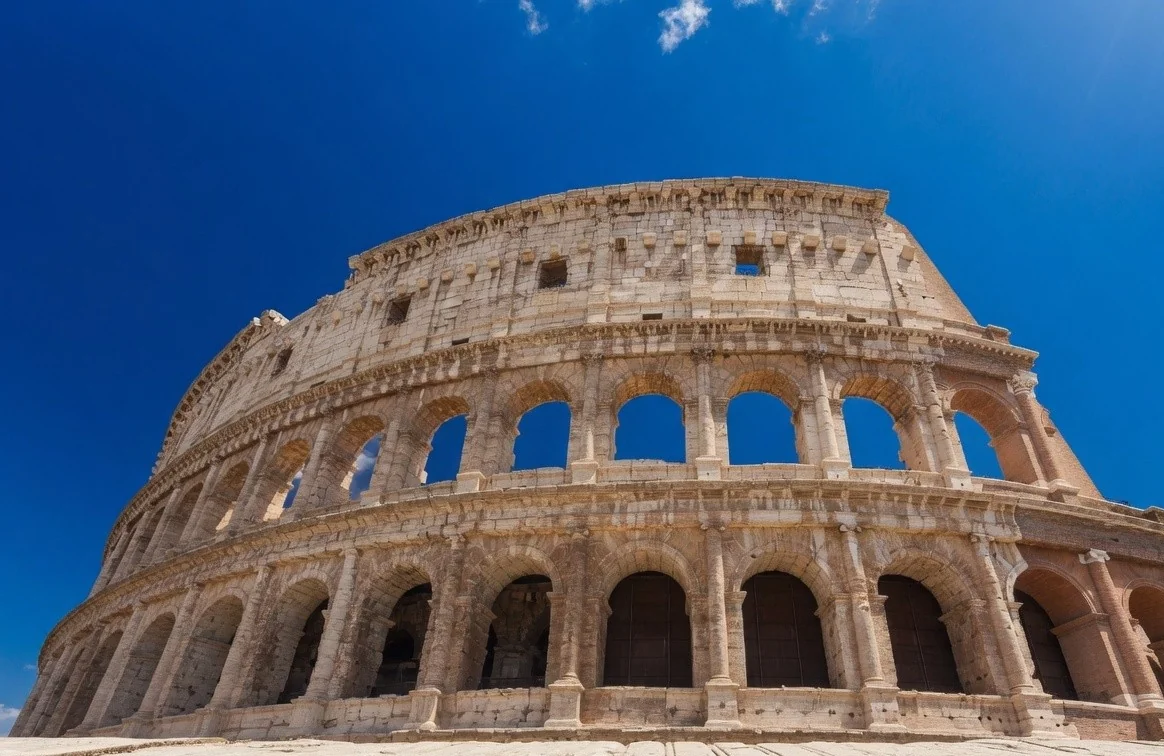 The Colosseum against a hard blue sky